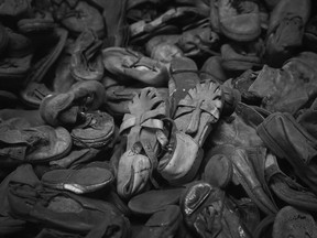 Children's shoes confiscated from Auschwitz prisoners lie in a display at the former Auschwitz concentration camp, which today is a museum, on January 25, 2015 in Oswiecim, Poland.