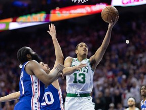 Boston Celtics guard Malcolm Brogdon (13) drives for a score past Philadelphia 76ers forward Georges Niang (20) at Wells Fargo Center.