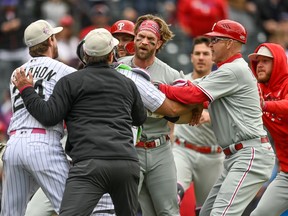 Bryce Harper of the Philadelphia Phillies runs on the field as the benches clear at Coors Field on May 14, 2023 in Denver, Colorado.