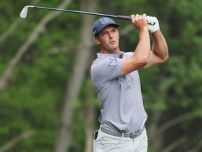 Bryson DeChambeau of the United States plays his shot from the third tee during the second round of the 2023 PGA Championship at Oak Hill Country Club on May 19, 2023 in Rochester, New York.
