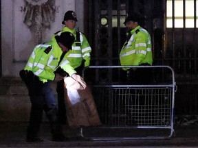 Police at the scene outside Buckingham Palace after a man was arrested and a subsequent controlled explosion was carried out on May 2, 2023 in London, England.