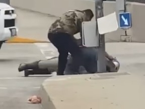 A Good Samaritan comes to the rescue of a California Highway Patrol officer tussling with a man.