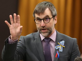 Secretary of State for Environment and Climate Change Steven Guilbeault rises during Question Time in the House of Commons on Parliament Hill in Ottawa on Thursday, May 18, 2023.