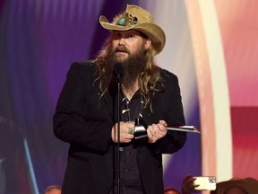 Chris Stapleton accepts the Entertainer of the Year award onstage during the 58th Academy Of Country Music Awards at The Ford Center at The Star on May 11, 2023 in Frisco, Texas.