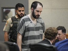 Daniel Perry enters the 147th District Courtroom at the Travis County Justice Center for his sentencing, Tuesday, May 9, 2023, in Austin, Texas. Perry, a U.S. Army sergeant, was convicted of murder in the fatal shooting of Air Force veteran Garrett Foster, 28, an armed protester during a Black Lives Matter demonstration in Texas.