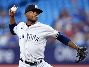 Yankees starting pitcher Domingo German delivers a pitch in the first inning against the Blue Jays at Rogers Centre in Toronto, Tuesday, May 16, 2023.