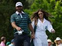 Dustin Johnson of the U.S. and wife Paulina Gretzky are pictured during the par 3 tournament at The Masters at Augusta National Golf Club in Augusta, Ga., April 5, 2023.