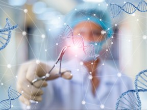 Researcher working with DNA on blurred background.