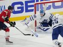 Florida Panthers centre Sam Bennett (9) tries to sneak a puck past Toronto Maple Leafs goalie Joseph Woll on Wednesday, May 10, 2023, during the first period of Game 4 at FLA Live Arena.