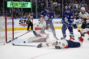 Florida Panthers forward Matthew Tkachuk (19) clears the puck away from goaltender Sergei Bobrovsky (72) as Toronto Maple Leafs forward John Tavares (91) and forward Auston Matthews (34) look on during the third period of game two of the second round of the 2023 Stanley Cup Playoffs at Scotiabank Arena May 4, 2023. John E. Sokolowski-USA TODAY Sports
