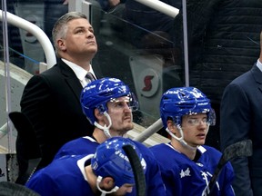 Sheldon Keefe looks up at the score clock during the third period, to check the time remaining in the game, or maybe even his tenure as head coach of the Leafs?