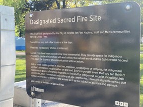 A sign errected by the city designating the park at Allan Gardens as the site of sacred fires.