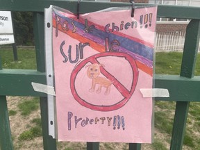 A sign drawn by a student of Rawlison Community School, after a latest dog attack led to a Grade 8 student being bitten on the face.