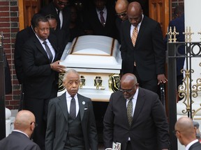 Mourners carry the casket of Jordan Neely at the Mount Neboh Baptist Church in Harlem after his funeral on May 19, 2023 in New York.