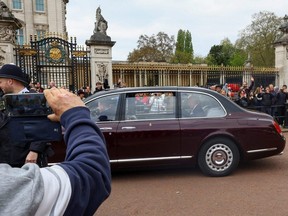 Britain's King Charles arrives at Buckingham Palace in London, Tuesday, May 2, 2023.