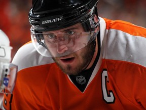 Flyers' Mike Richards takes a faceoff. He was part of two playoff runs that saw his team rally from an 0-3 deficit to win a series.