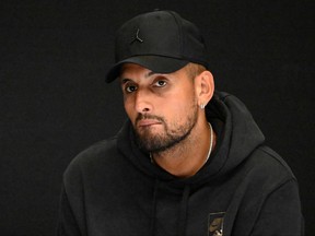 Australia's Nick Kyrgios speaks during a press conference on day one of the Australian Open tennis tournament in Melbourne on Jan. 16, 2023.