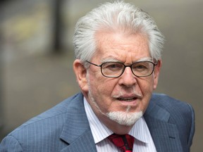 Rolf Harris arrives at Southwark Crown Court in London June 27, 2014.