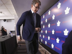 Maple Leafs President Brendan Shanahan departs the podium in Toronto on Friday, May 19, 2023 after announcing that Kyle Dubas will not be returning to the organization as general manager.