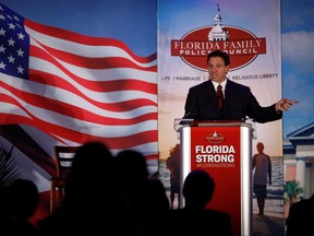 Florida Governor Ron DeSantis gestures as he speaks during the Florida Family Policy Council Annual Dinner Gala in Orlando, Fla., May 20, 2023.