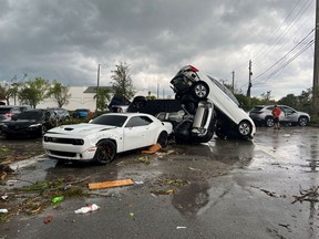 View of vehicles piled up at a parking lot following a suspected tornado in Palm Beach Gardens, Florida, April 29, 2023 in this picture obtained from social media.