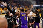 May 4, 2023; San Francisco, California, USA; Los Angeles Lakers forward LeBron James (6) tosses powder into the air before the start of game two of the 2023 NBA playoffs against the Golden State Warriors at the Chase Center. 