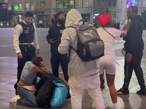 A video posted on social media shows two woman in a lengthy brawl at Yonge-Dundas Square as security guards stand around watching.