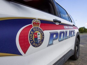 Police are looking for suspects after two armed bandits carjacked a vehicle in Markham.