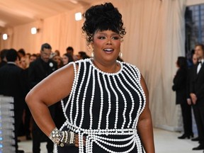 US singer Lizzo arrives for the 2023 Met Gala at the Metropolitan Museum of Art on May 1, 2023, in New York. – The Gala raises money for the Metropolitan Museum of Art’s Costume Institute. The Gala’s 2023 theme is “Karl Lagerfeld: A Line of Beauty.” (ANGELA WEISS / AFP)