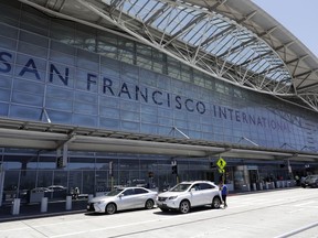 Vehicles wait outside San Francisco International Airport