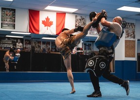 Head coach Kru Alin Halmagean trains Mike (Proper) Malott at House of Champions in Stoney Creek, Ont., ahead of her fight at UFC 289 in Vancouver, B.C., on June 10, 2023.