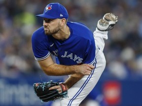Toronto Blue Jays relief pitcher Zach Pop (56) throws in the third inning of their American League MLB baseball game against the Boston Red Sox.