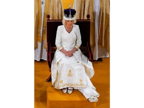 Queen Camilla receives Queen Mary’s Crown during her coronation ceremony in Westminster Abbey, London, May 6, 2023.