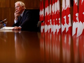 David Johnston, special rapporteur on foreign interference, holds a press conference about his findings and recommendations, in Ottawa, Ontario, Canada May 23, 2023.
