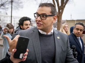 Rep. George Santos, R-N.Y., leaves a House GOP conference meeting on Capitol Hill in Washington, Jan. 25, 2023.
