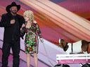 Garth Brooks and Dolly Parton host at the 58th Academy of Country Music (ACM) Awards in Frisco, Texas, May 11, 2023. 