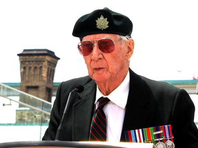 Veteran Alex Adair speaks at Remembrance Day ceremony at Old City Hall in 2014. He died Christmas Eve 2022 at 99