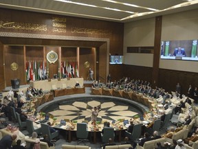 In this photo released by Egypt's Ministry of Foreign Affairs, delegates and foreign ministers of member states convene at the Arab League headquarters in Cairo, Egypt, Sunday, May 7, 2023.