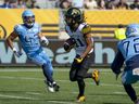 Hamilton Tiger Cats wide receiver Lio'undre Gallimore (81) runs on his way to a long return for a touchdown against the Toronto Argonauts during first half CFL pre-season football action in Hamilton on May 27, 2023.