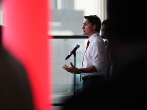 Prime Minister Justin Trudeau speaks to reporters at the Liberal party convention in Ottawa on Friday, May 5, 2023.