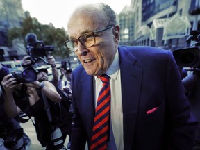 Rudy Giuliani arrives at the Fulton County Courthouse