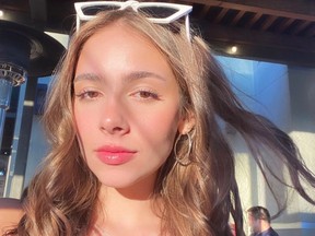 Actress Haley Pullos poses for a selfie.