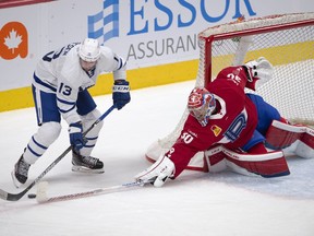 Laval Rocket goaltender Carey Price poke checks Toronto Marlies' Stefan Noesen during second period American Hockey League action in Montreal, Monday, May 17, 2021. The Marlies won't be renewing the contracts of head coach Greg Moore and assistants A.J. MacLean and John Snowden, the club announced Friday.