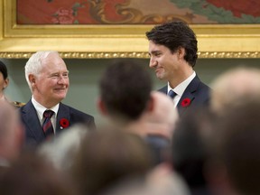 Prime Minister Justin Trudeau stands with Governor General David Johnston after being sworn in as Prime Minister at Rideau Hall in Ottawa on Nov. 4, 2015.