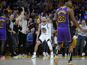 Golden State Warriors guard Stephen Curry (30) celebrates during the second half of Game 2 of an NBA basketball Western Conference semifinal game against the Los Angeles Lakers, Thursday, May 4, 2023, in San Francisco.