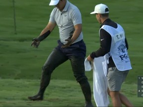 Tom Kim gets covered in mud during the first round of the PGA Championship.