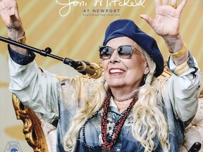 This cover image released by Rhino Records shows "At Newport," an 11-track set by Joni Mitchell, recorded at the Newport Folk Festival last summer.