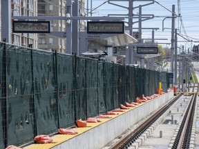 Ontario's transit agency says the consortium building the delayed midtown Toronto light trail transit line intends to launch a legal challenge over the project. "Out of Service" signs are shown on the Eglinton Crosstown LRT in Toronto on Friday, May 5, 2023.