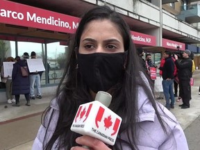 Karamjeet Kaur, a 25-year-old former international student from India, is facing deportation. Kaur is shown in this still from a video interview in Toronto, where students protested deportation, Wednesday, May 3, 2023.