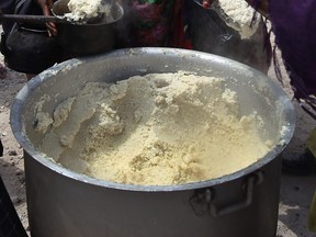 Porridge is given by aid workers in Somalia